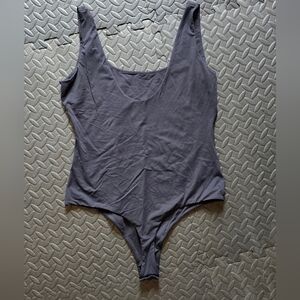 Effortless Style: PUMIEY Size Large Bodysuit (New Without Tags)